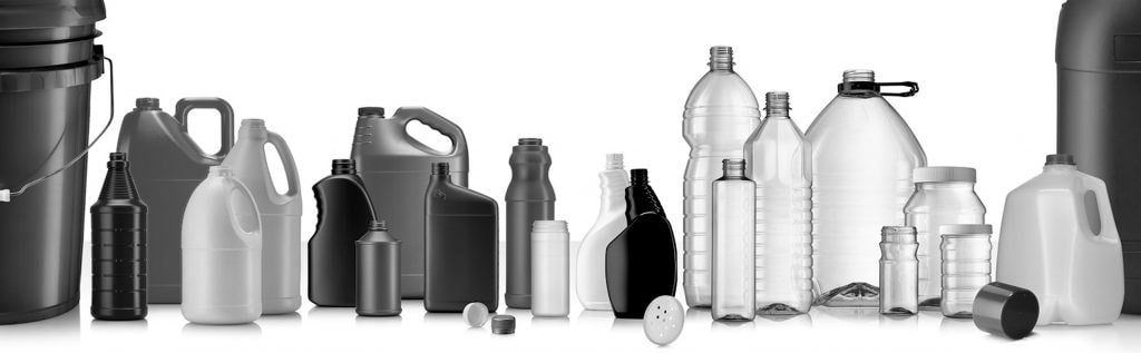 A row of various plastic bottles and containers in different shapes and sizes, showcasing the versatility of plastics in grayscale. The assortment includes jugs, bottles with lids, and a large bucket on the left.