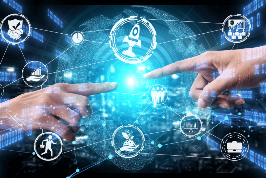 Two hands pointing at a digital interface displaying futuristic icons connected by lines. Icons include a rocket, graphs, gears, and human figures, suggesting themes of technology, innovation, and teamwork against a blue, tech-inspired background.