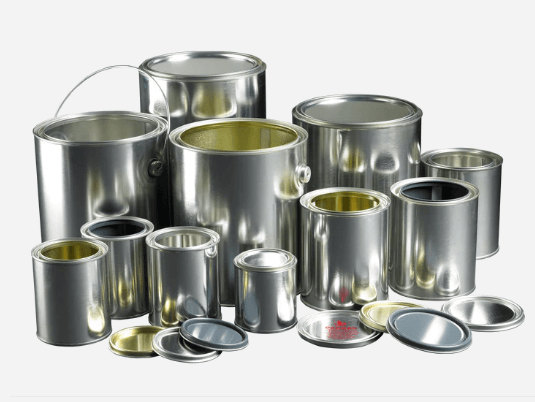 A collection of silver metal paint cans of varying sizes with lids, arranged on a white background. Some lids are off, revealing the empty interiors of the cans.